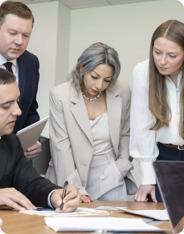 Group looking at desk