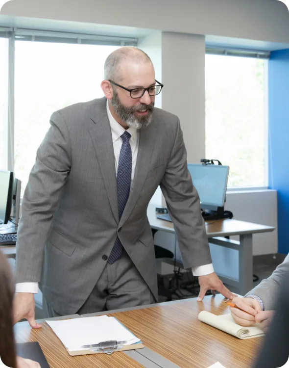 Man standind during meeting